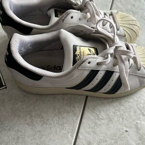 Adidas White Sneakers with Black Stripes
